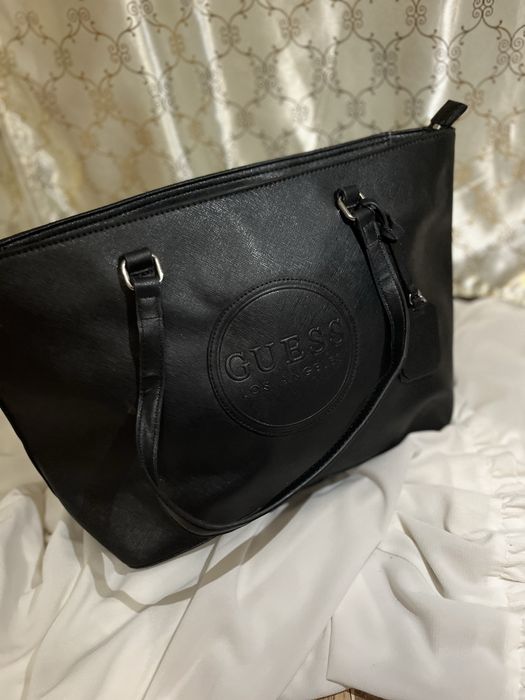 Geanta nouo de culuare neagra medie spatioasa ati ancap multe an ea