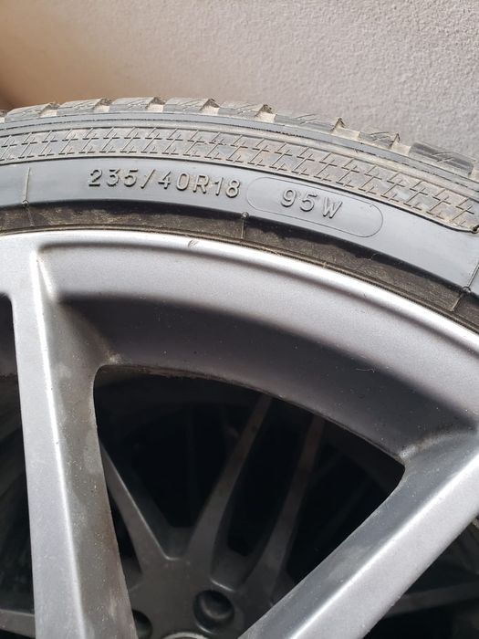 Set jante originale Audi 18″ + anvelope 235/40 R18 – stare foarte bună