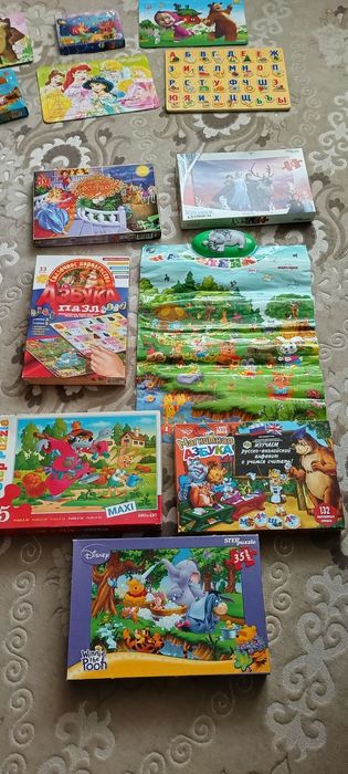 Пазлы и игры в ассортименте.