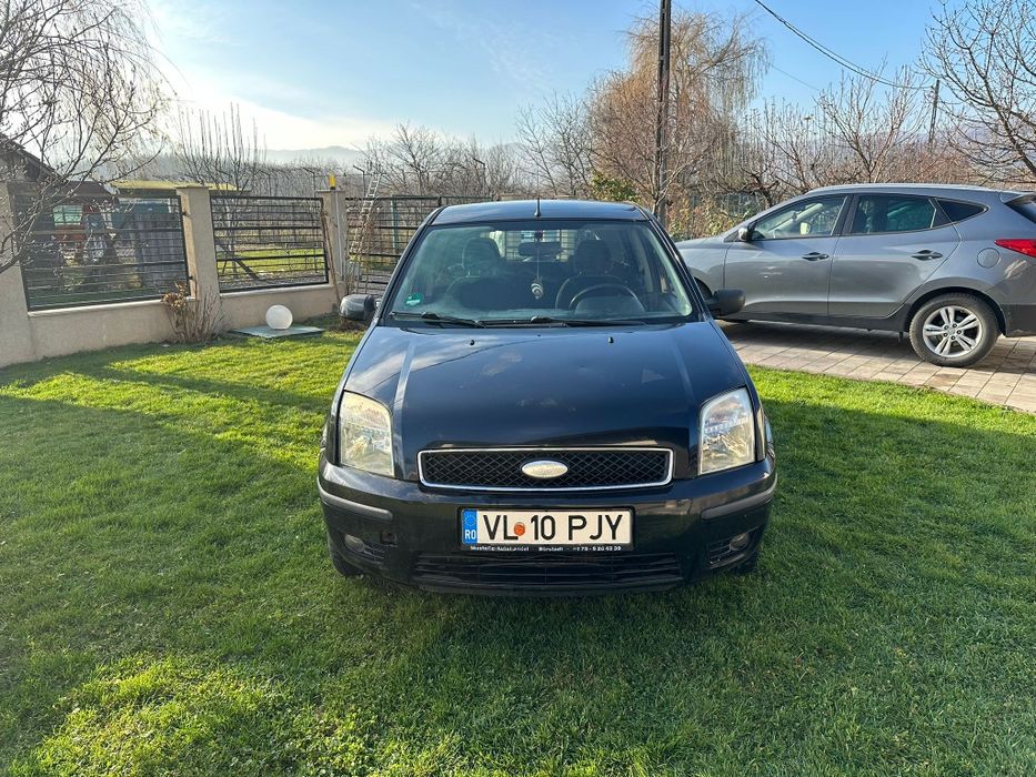 Ford Fusion,1.4 tdci,an 2004, înmatriculat.