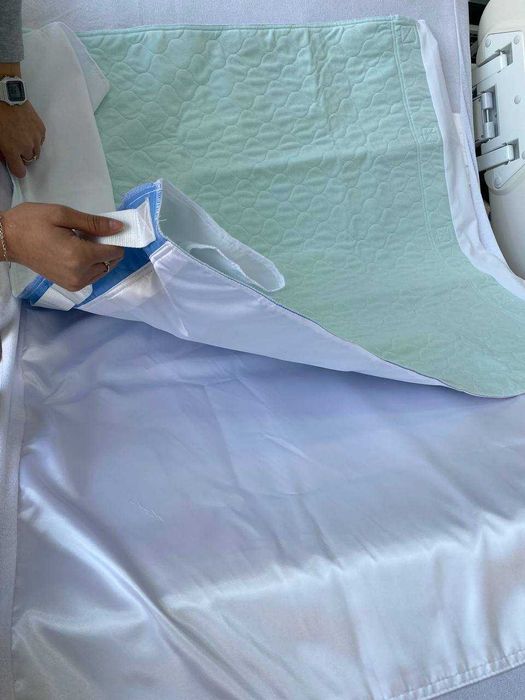 Медицинская простыня с наматрасником прердвижной