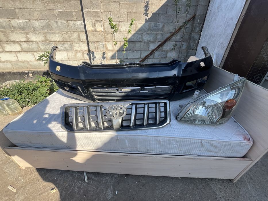 Комплект запчастей Toyota Prado 120 (бампер, решетка, фара)