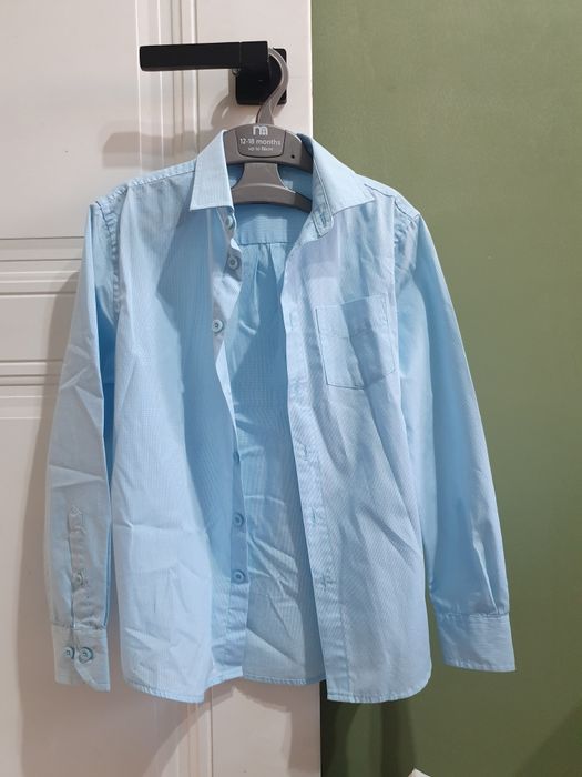 Новая рубашка,за 1500 тенге.