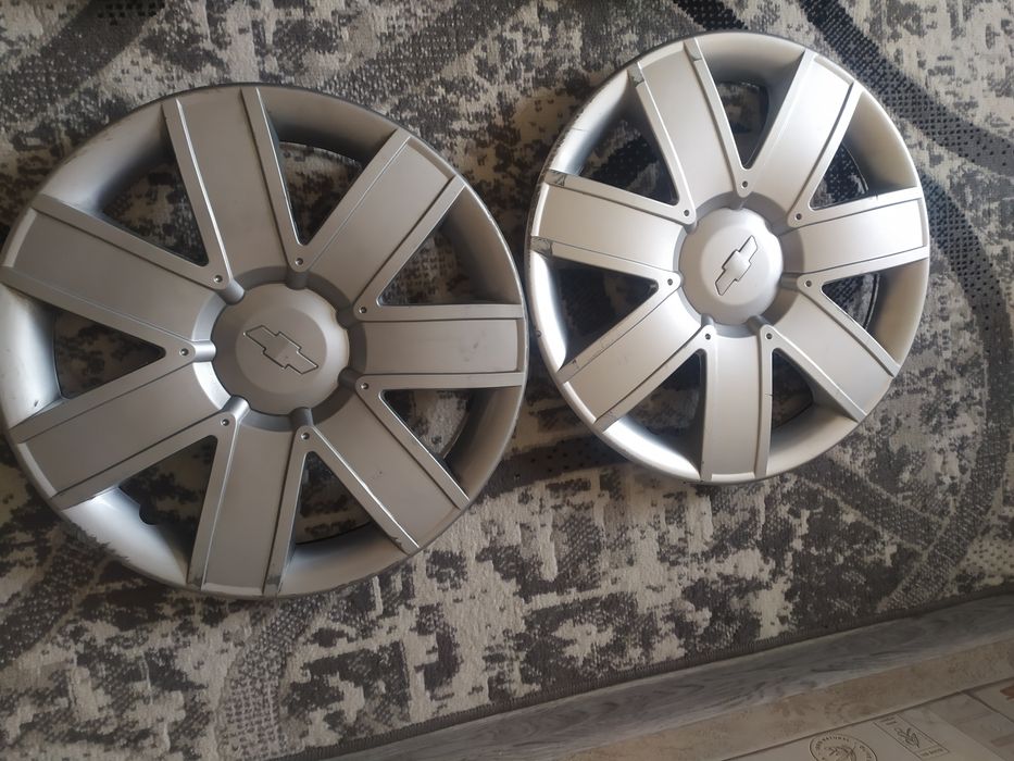 Калпаклар 15 нексия 3 ники, 4 таси янгидай, 2таси б/у, 6 таси 100 минг