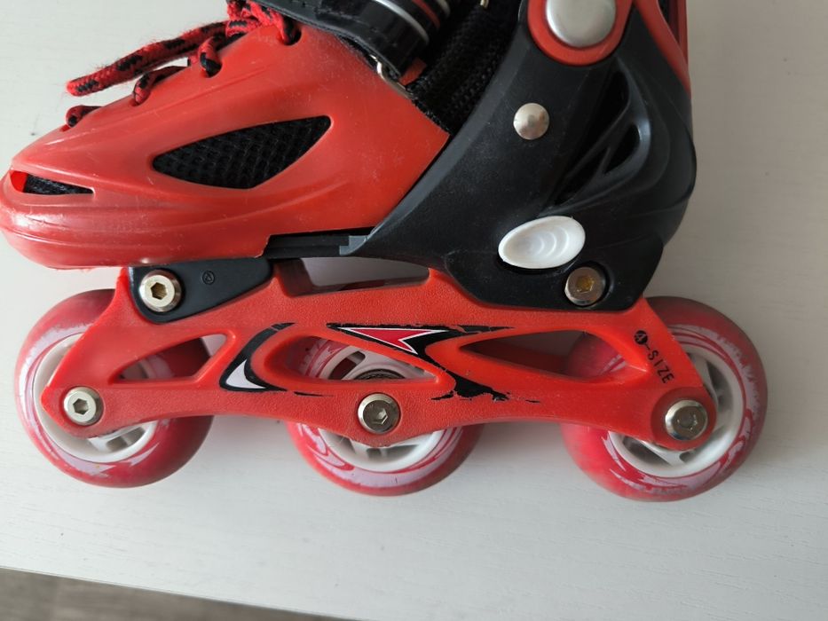Коньки+ ролики растущие 26-29 рр