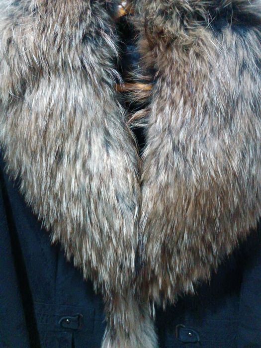 Palto yangi kiyilmagan