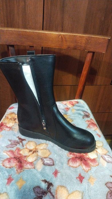 Женские сапоги..