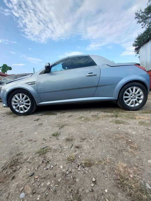 Stopuri Opel Tigra Cabrio Decapotabila