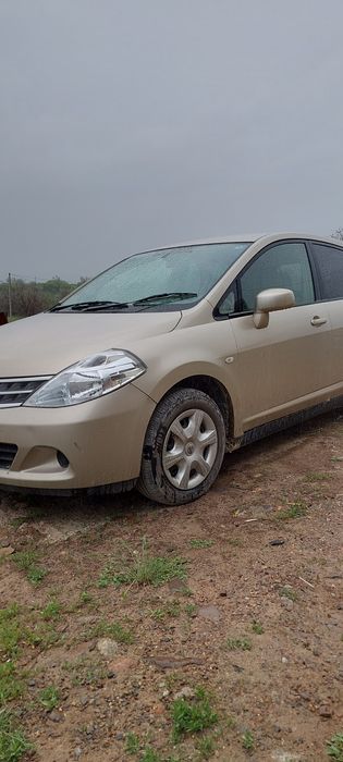 Ниссан тида япония