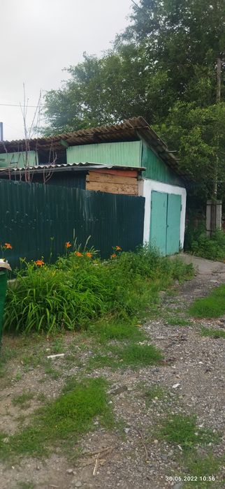 Продам дом с  действующим сто