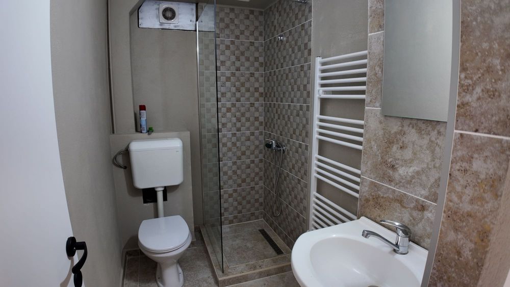 Apartament în Centru lângă UMF (Fostul MALL) de vânzare, 2 Camere, Decomandat 49mp