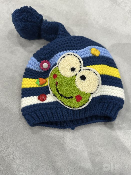 Тёплая шапка для малчиков . подходит для детей 1-2 лет.