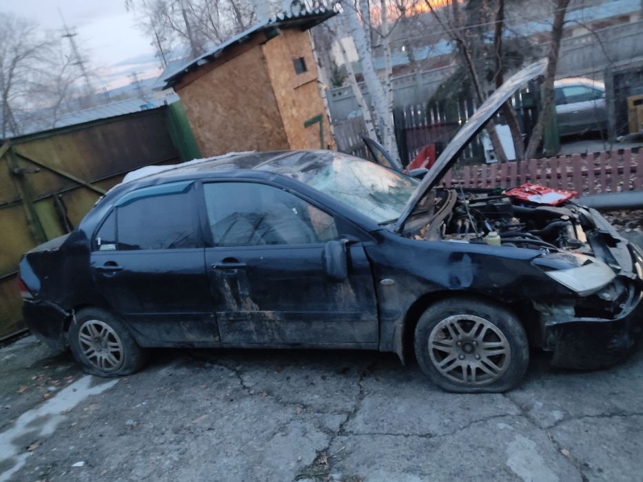 По запчастям Лансер