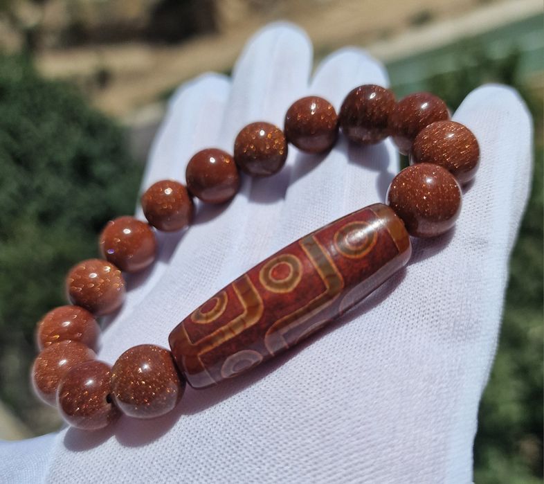 Браслеты с Бусинами Дзи.