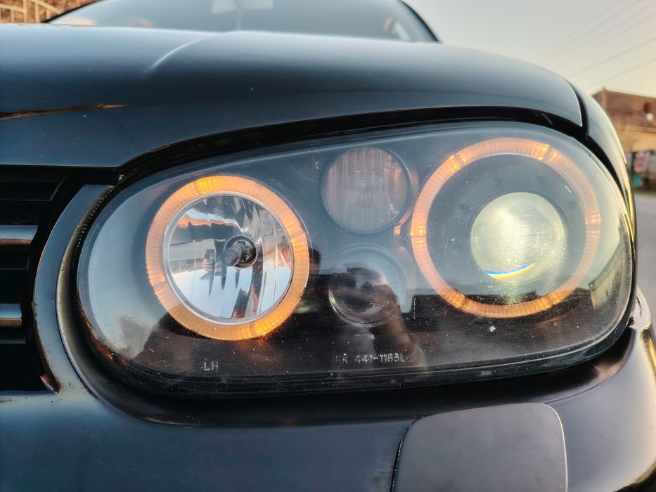 Set faruri Vw Golf 4  cu angel eyes si lupă