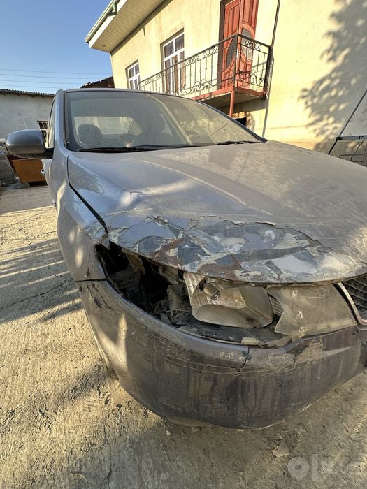 Kia forte 2009 xolati ortacha remont qivorish kerak