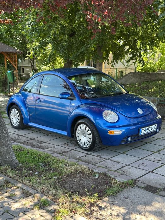 VW Beetle - 1.6 benzina - 102 CP - 178k Km - E4 - AC - Incalzire scaune - Geamuri si oglinzi electrice - Inchidere centralizata - 2002