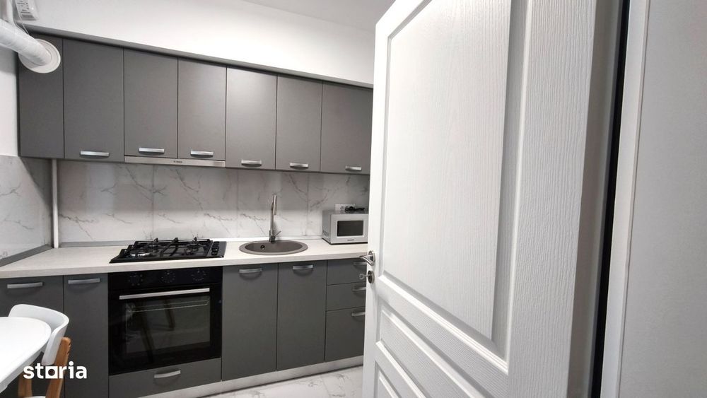 Apartament 1 camera mobilat, etaj 1, bloc NOU, statie autobuz CUG - VA — fotografia 3