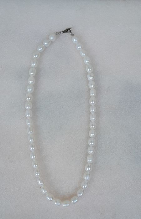 Новые бусы из жемчуга.