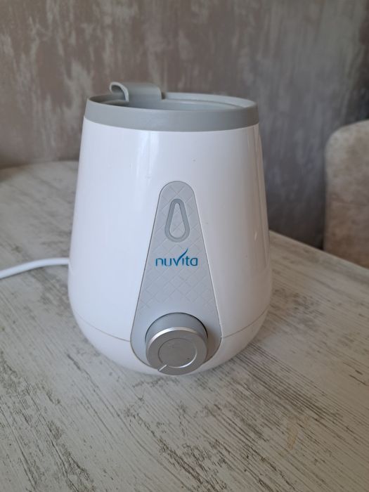 Нагревател за шише/ Уред за затопляне