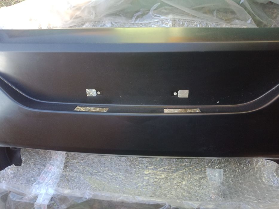 Бампер задний на Kia Rio