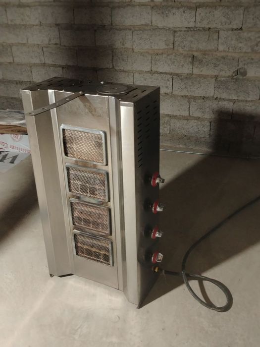 Shavurmani go'shtini pishiraydigon aparat holati yahshi