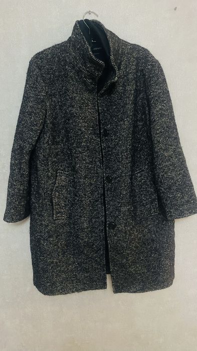 Брендовое, очень теплая, на Алматинскую зиму самое то.