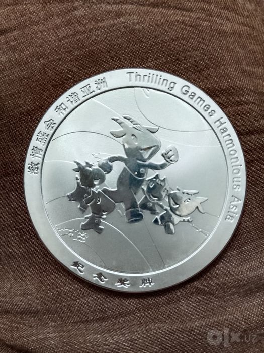 Медаль 16 Азиатских игр 2010 года