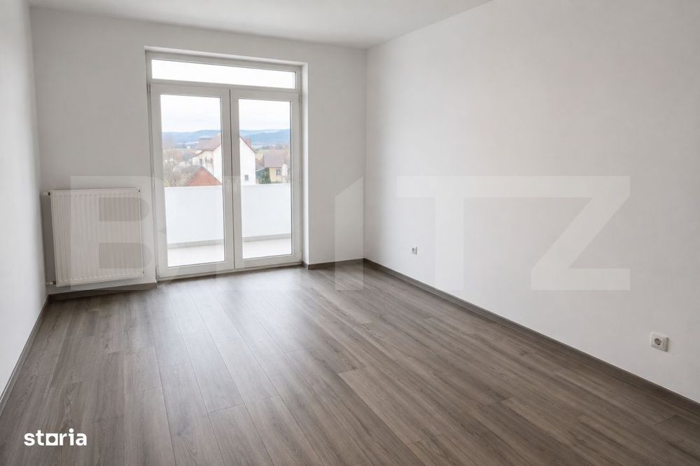 Apartament 3 camere,2 balcoane,pod,pivnita,parcare,etaj 2,zona Joagar