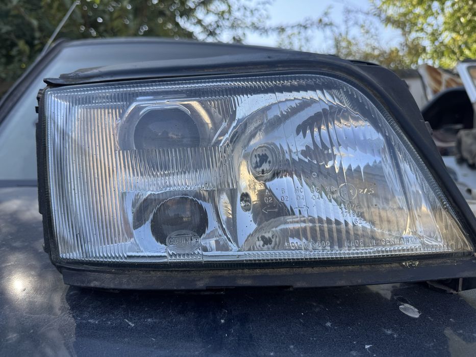 Ауди правая фора А6 оргинал хелла