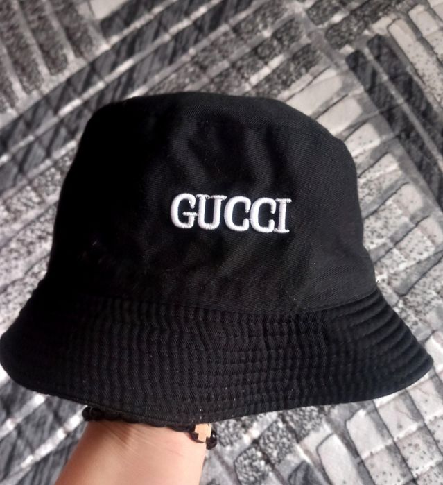 Pălărie Gucci fake