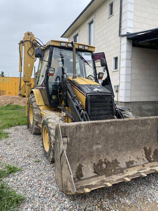 Услуги экскавтор погрузчика