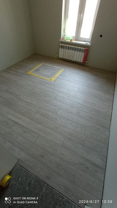 Укладка ламината профессионально.