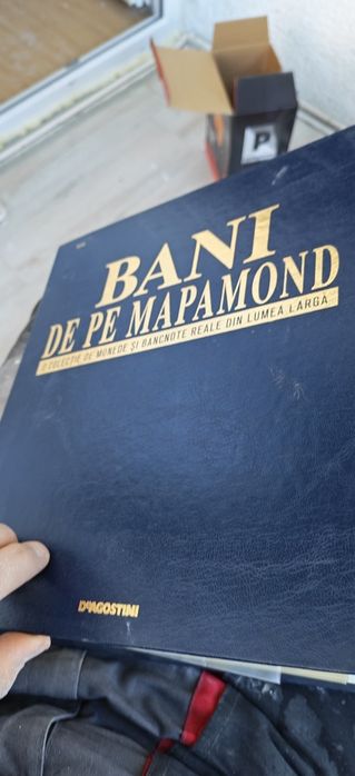 Album complet DeAgostini Bani de pe Mapamond – monede și bancnote reale.