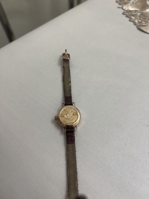 Золотые часы Ника