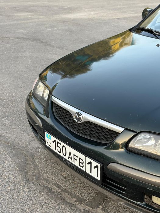 Мазда 626 птичка
