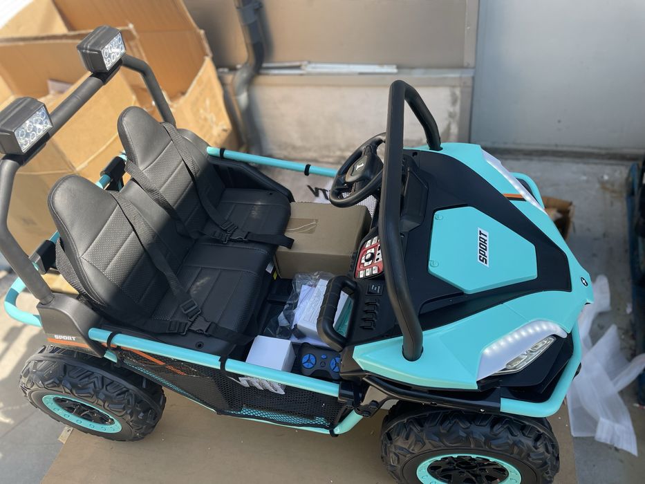 UTV electric pentru 2 copii Faster,  motoare 2x150W, baterie 24V 9Ah, telecomanda 2.4 GHz, roti din spuma EVA si Scaun Piele