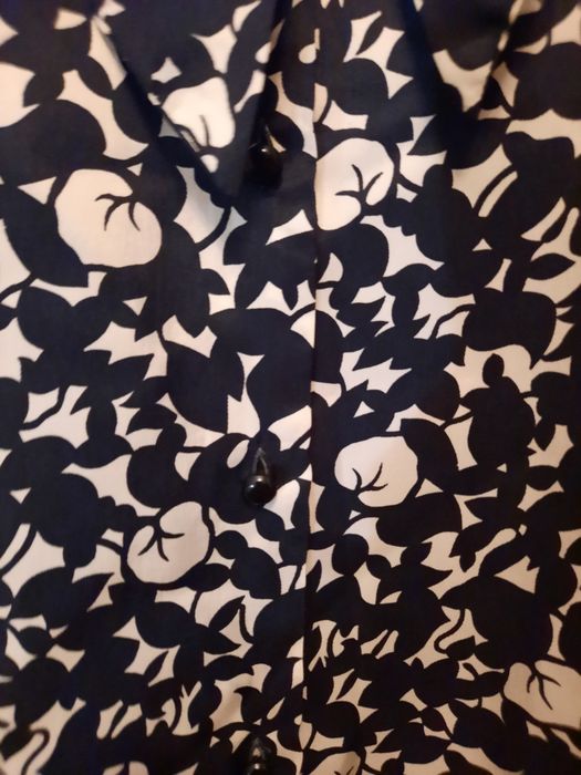 Deosebita bluza negru cu alb mărimea 48-50