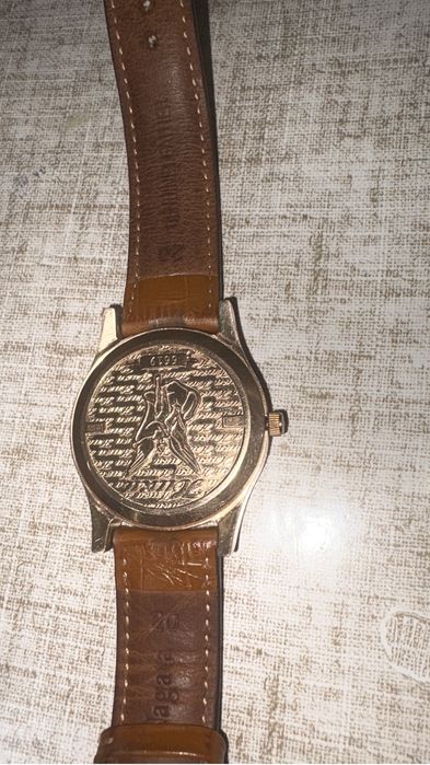 Золотые часы ника