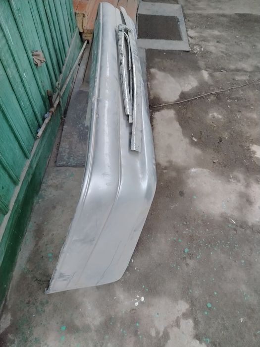 ЗАДНИЙ БАМПЕР Мерседес 210 лупарь дорисьайдинг