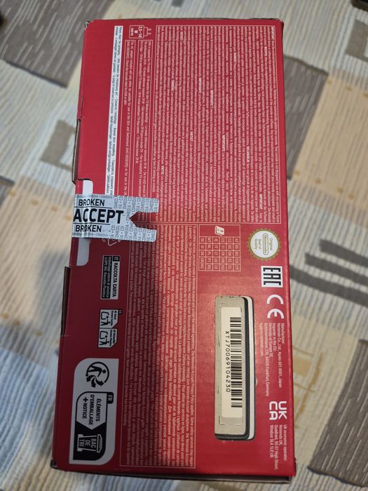 Nintendo Switch OLED - Neon Red & Neon Blue
