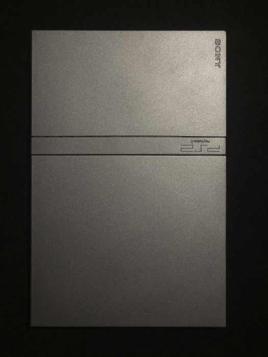 Consolă PlayStation 2 Slim SCPH-77004 Silver, în stare perfectă