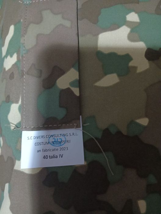 Costum intemperii combat nou