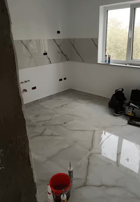 Echipă de Meseriași executam lucrări