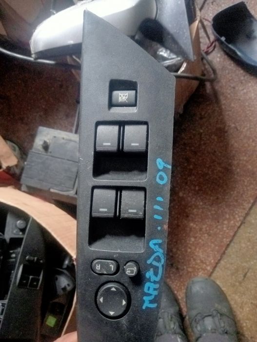 Comenzi geamuri  scaune oglinzi Mazda 3.  2009