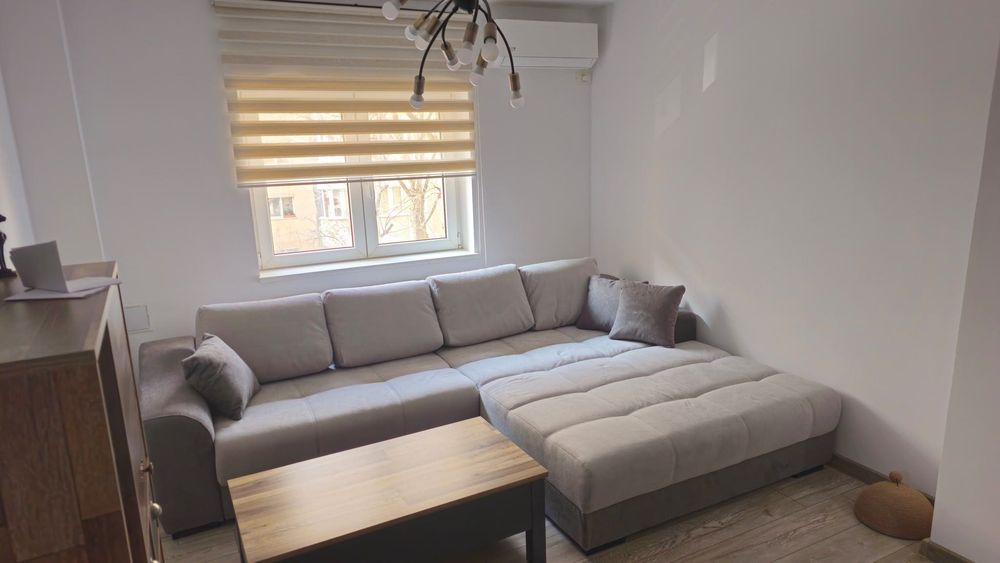 Coltar extensibil Mobexpert stofa gri cu perne incluse