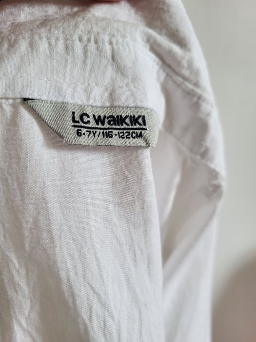 Продам белую рубашку для мальчиков