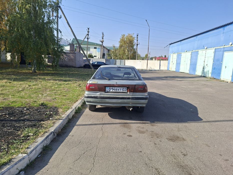 Мазда 626 2.0 литровый