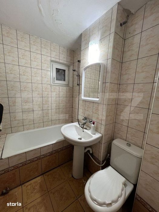 Apartament 3 camere, 70 mp, parter cu balcon, zona Centrala