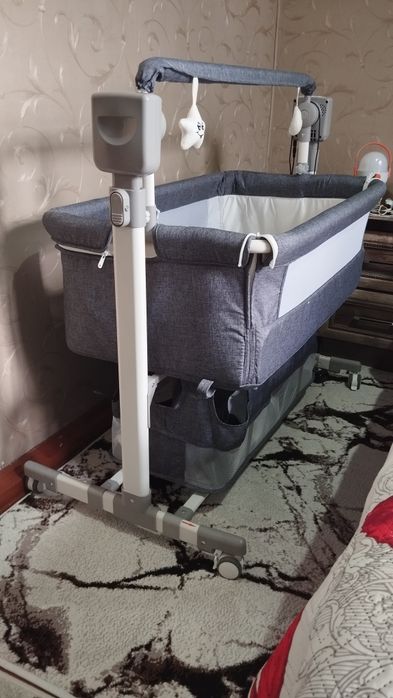 Продам Приставную кроватку